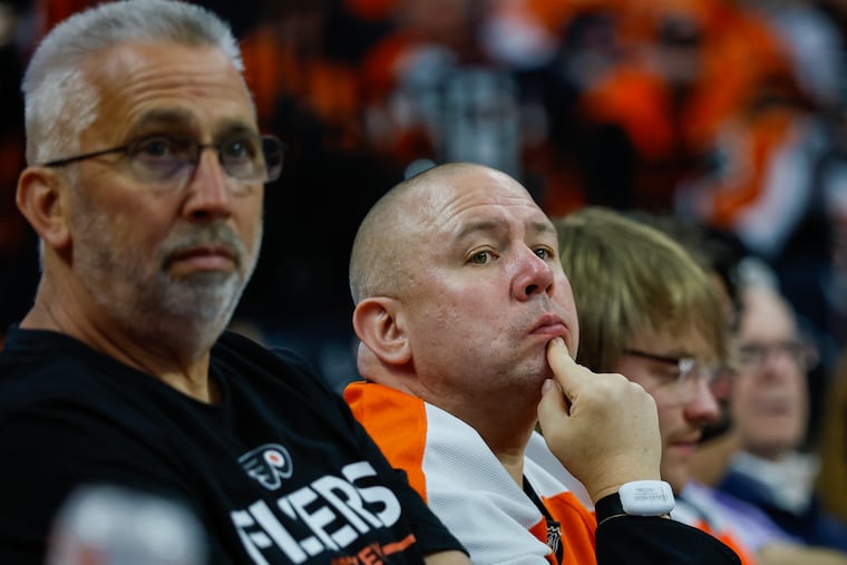 Flyers fans watch on after the Hurricanes score a fourth goal during the third period of Game 3.