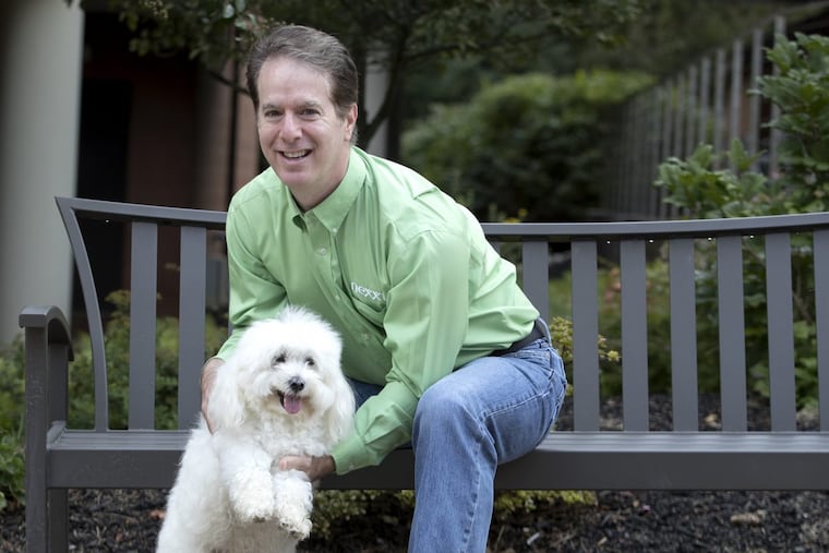 Rich Milgram of Nexxt with his dog, Twizzler.