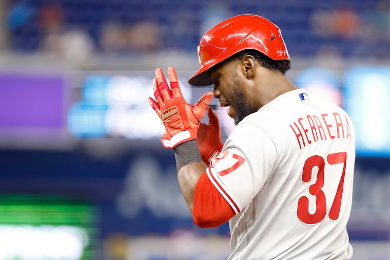 Philadelphia Phillies' Odubel Herrera (37) reacts after singling in a run during the 10th inning of a baseball game against the Miami Marlins, Sunday, Sept. 5, 2021, in Miami. (AP Photo/Rhona Wise)