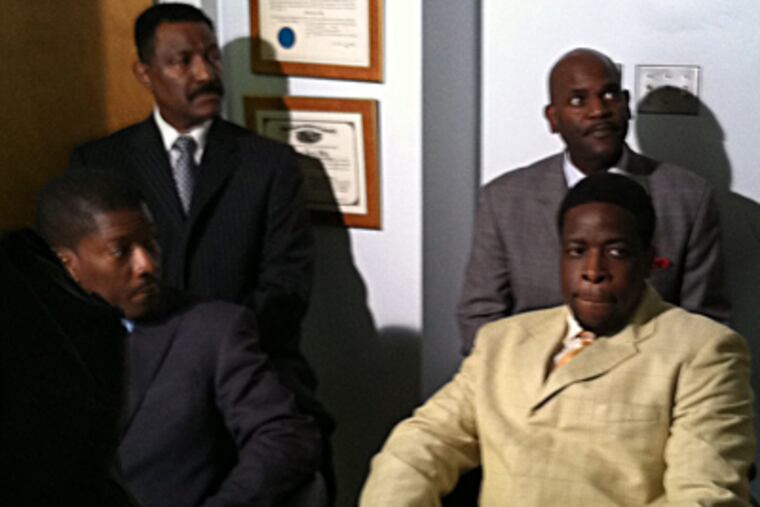 Lawyer Brian K. Wiley (top right), with clients (clockwise) Solomon Daniels, Eddie Clarke, Barry Murphy, who have filed federal and state complaints. JANE M. VON BERGEN / Staff