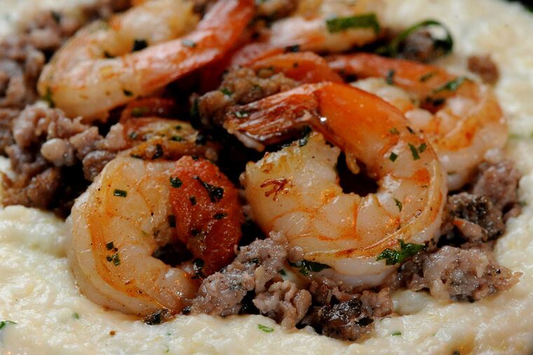 Shrimp and grits, a satisfying Southern meal priced right at $17. ( CLEM MURRAY / Staff Photographer )