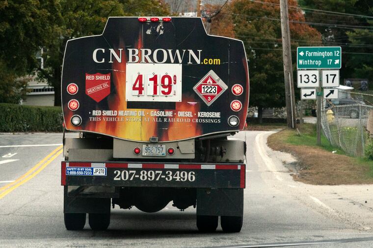 A fuel delivery truck advertises its price for a gallon of heating oil in Maine on Oct. 5.