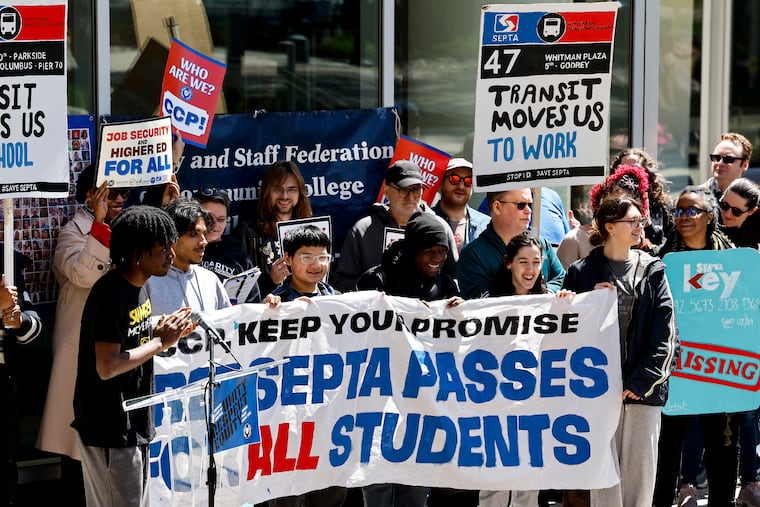 Faculty, staff and students gather for a press conference where they said the college must get free SEPTA passes for students.
