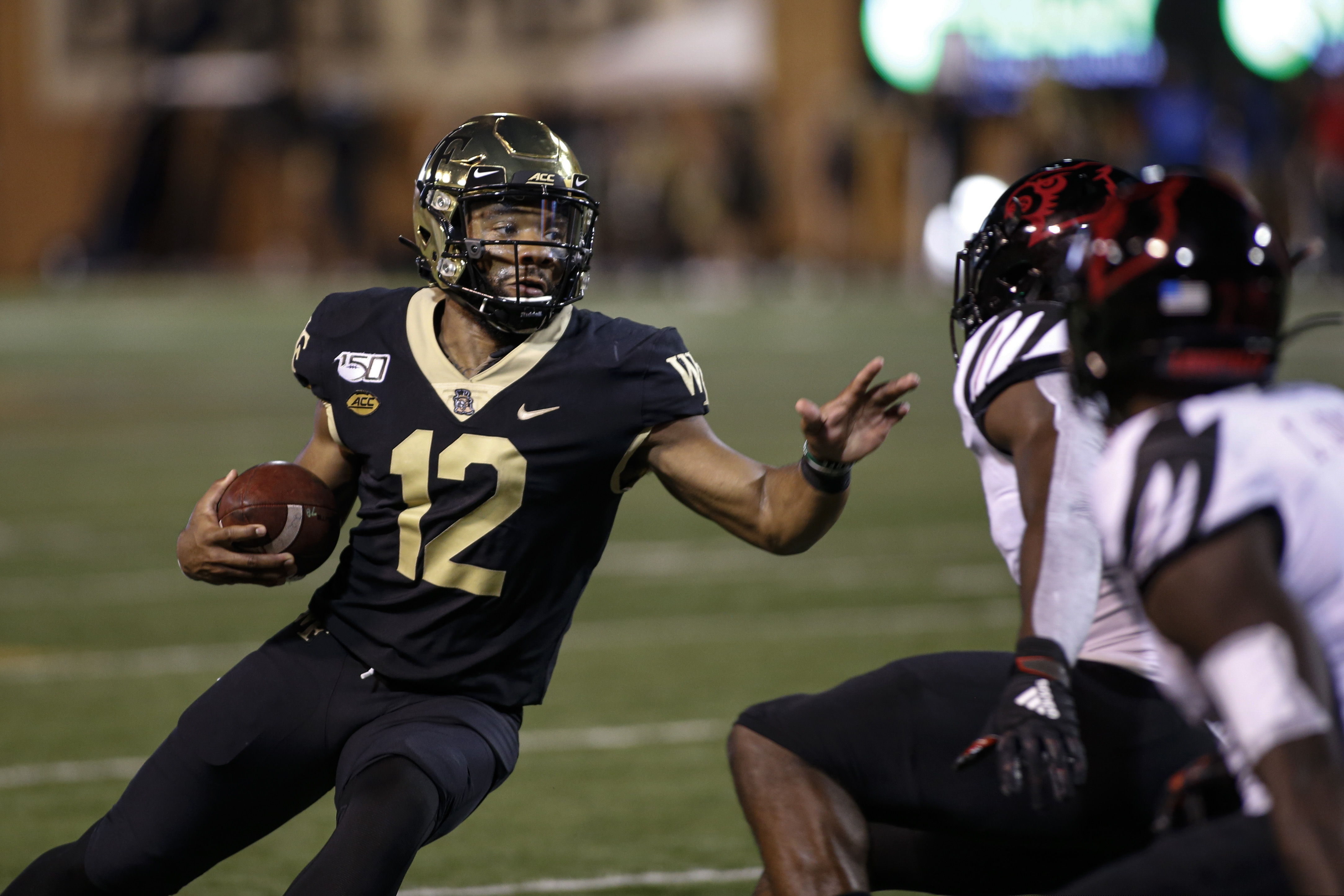 Jamie Newman, then playing for Wake Forest, on the run against Louisville in 2019.