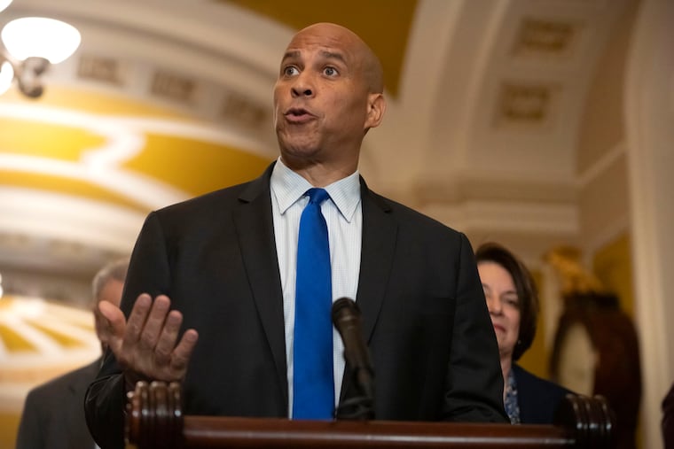 Sen. Cory Booker (D., N.J.) speaks to reporters after a Senate policy luncheon on Capitol Hill in March.