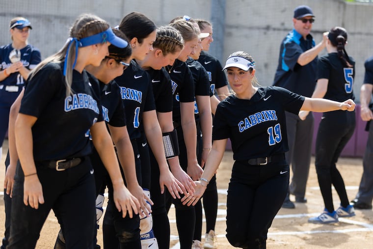 When Cabrini University announced last summer that it would close at the end of this academic year, the women's softball team roster dwindled from 20 players to nine, just like that. Sam Taddei is introduced before their double header against Penn State Brandywine on April 16, 2024
