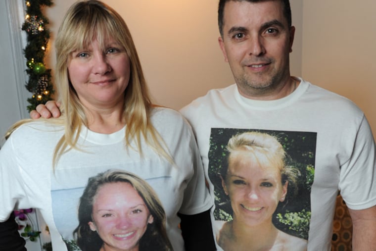Donna and Steve Gallo, wearing t-shirts of their daughter Nicole, who died after being struck by a driver under the influence more than four years ago. Nicole was 19-years-old at the time. Portrait taken Jan. 28, 2014 at the Gallo home. (CLEM MURRAY/Staff Photographer)