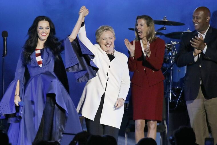 Katy Perry with Hillary Clinton, Katie McGinty, and Dwight Evans during a concert in support of Clinton at the Mann Center in November.