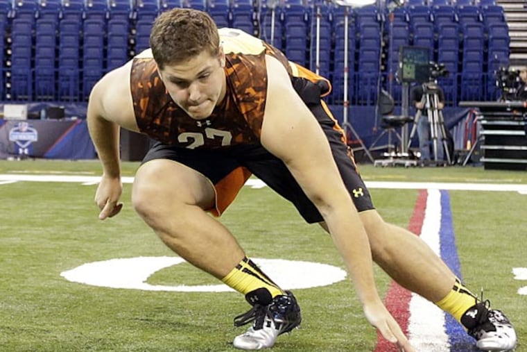 Texas A&M offensive lineman Luke Joeckel runs a drill during the NFL football scouting combine in Indianapolis, Saturday, Feb. 23, 2013. (AP Photo/Dave Martin)