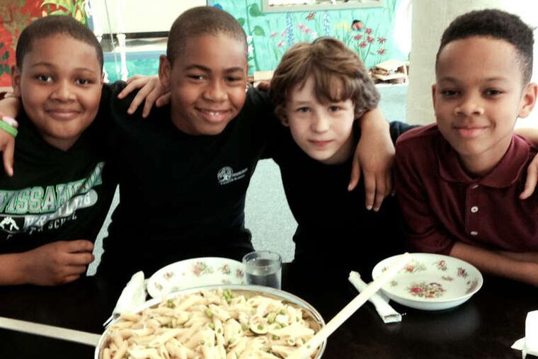 At Wissahickon Charter are healthy-cooking students (from left) Raymond Hankins, Joseph Taylor, Anthony Bové, and Ryiese Randolph.