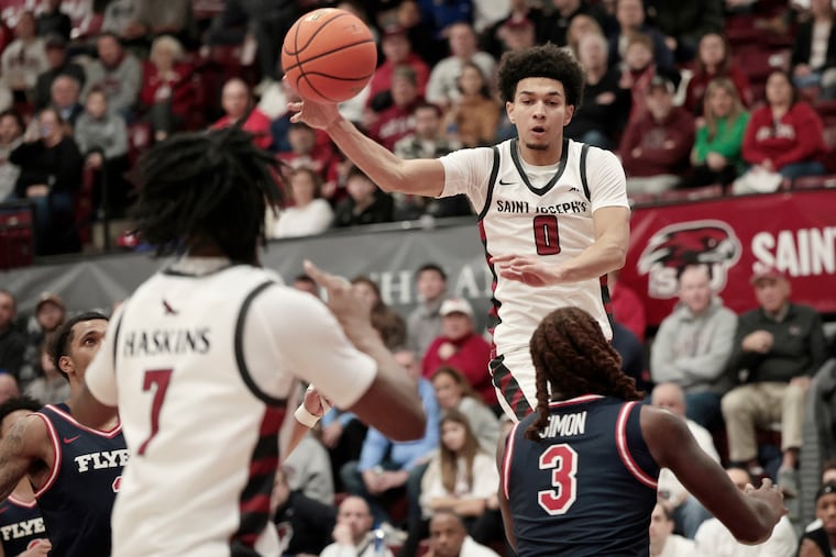 Senior guard Derek Simpson (0) has averaged 19.2 points in the last six games for St. Joseph's.