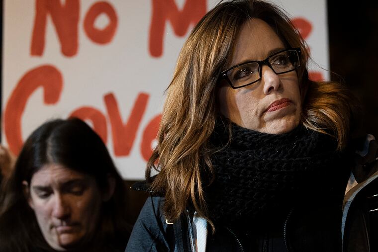 Patty Fortney-Julius, of Harrisburg, right, gathers with others to protest during the United States Conference of Catholic Bishops in Baltimore last fall.
