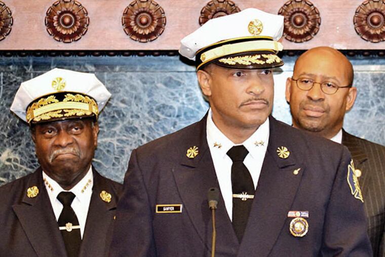 Derrick Sawyer takes questions from the press after Mayor Nutter announced that he will be replacing Lloyd Ayers as Philadelphia's new Fire Commissioner. Wednesday, June 4, 2014. C.F. Sanchez / Staff Photographer