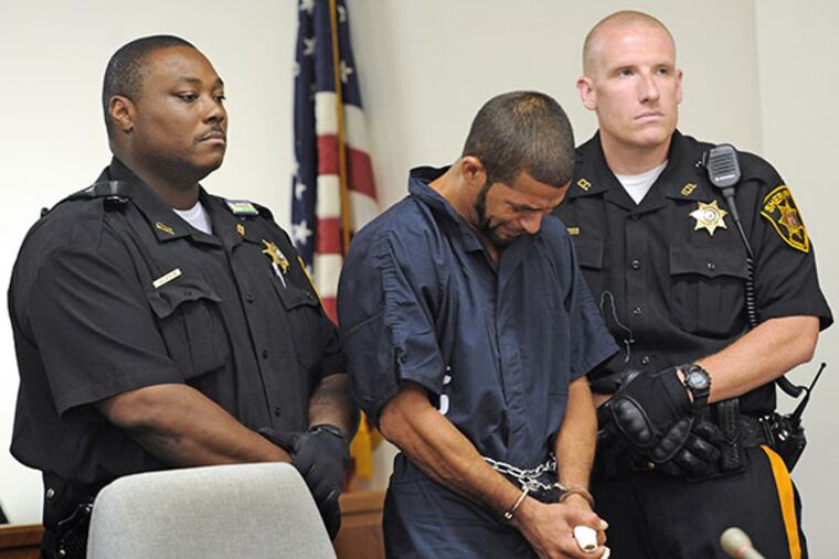 Osvaldo Rivera, who slashed two children's throats in Camden, at his arraignment. (April Saul / Staff Photographer)