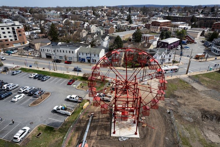 Construction continues on the Phoenix Wheel. The 133-year-old Phoenix Wheel predates the patent for the Ferris wheel. The wheel sits adjacent to Borough Hall.