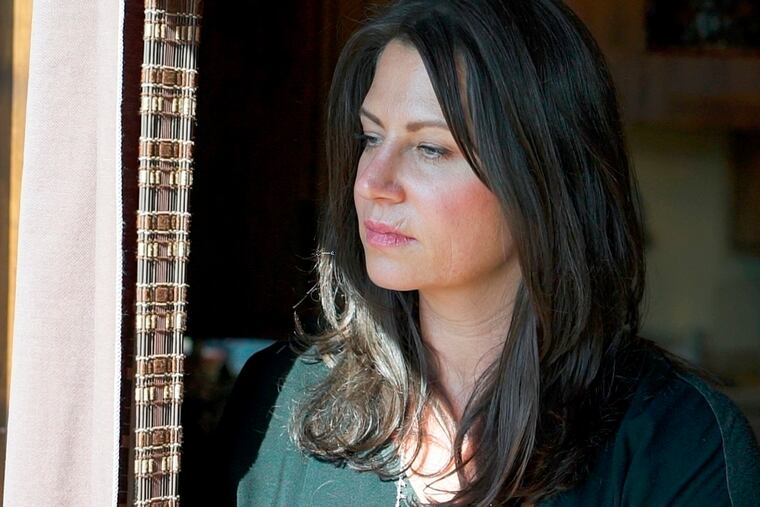 FILE - In this undated file photo provided by the Southern Poverty Law Center, Tanya Gersh poses for a photo. Magistrate Judge Jeremiah Lynch ruled Friday, April 5, 2019, that the Daily Stormer founder Andrew Anglin is not excused from returning to the U.S. for questioning in a lawsuit accusing him of orchestrating an anti-Semitic “troll storm” against Gersh, a Montana real estate agent, and her family. (Dan Chung / Southern Poverty Law Center via AP, File)