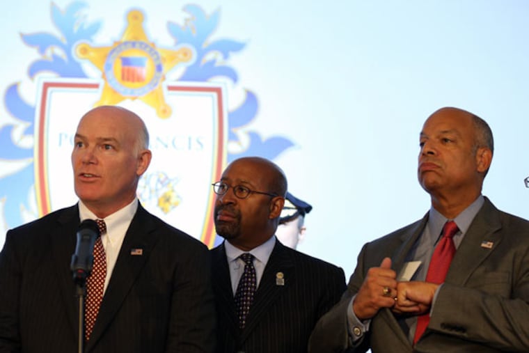 Talking papal security (from left): U.S. Secret Service Director Joseph Clancy, Mayor Nutter and
Homeland Security Secretary Jeh Johnson. (DAVID MAIALETTI/STAFF PHOTOGRAPHER)