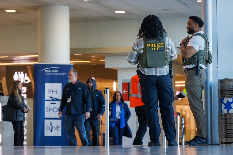 I.C.E officers standing around at Philadelphia International Airport, Terminal D/E TSA screen area on Tuesday, March 24, 2026.