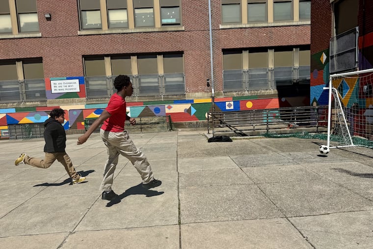 Students play soccer after school at Overbrook Elementary, one of 17 schools slated to be closed by the Philadelphia School District in 2027.
