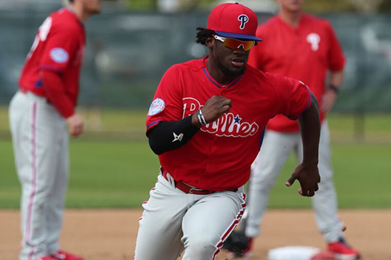 Odubel Herrera runs to third at a full squad practice at Bright House
Field in Clearwater, Fla. (David Swanson/Staff Photographer)