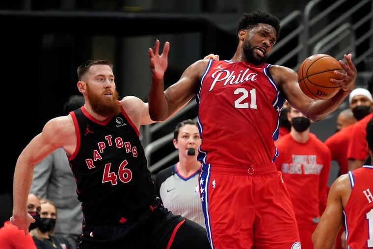 It wasn't a big offensive game for Joel Embiid, but his teammates picked him in Tuesday's win over the Raptors.