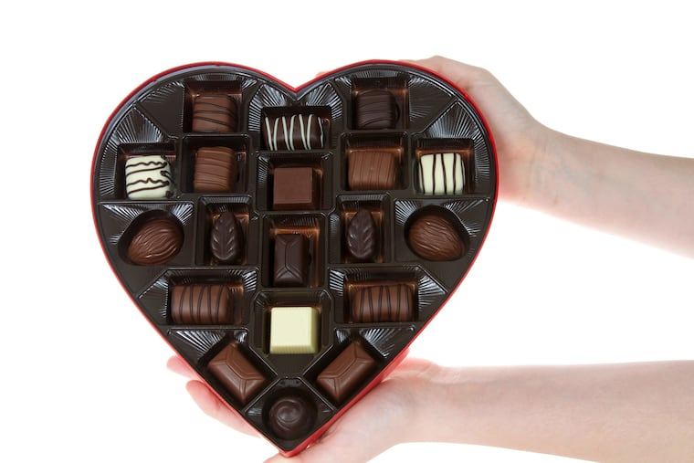 Heart shaped box with chocolate candies are a common gift for Valentine's Day.