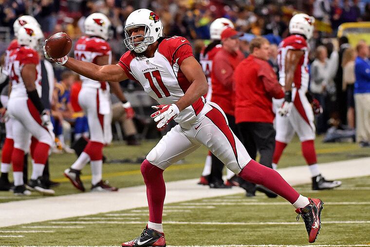 Arizona Cardinals wide receiver Larry Fitzgerald (11) warms up before the game between the St. Louis Rams and the Arizona Cardinals at the Edward Jones Dome.