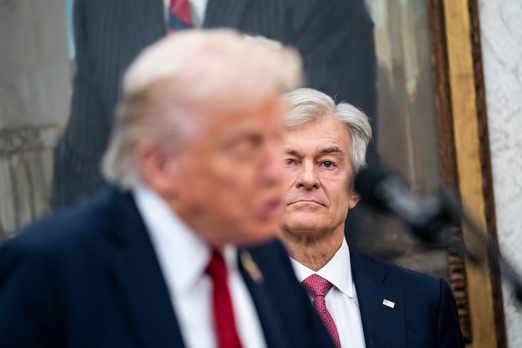 President Trump along with Centers for Medicare & Medicaid Services Administrator Mehmet Oz.