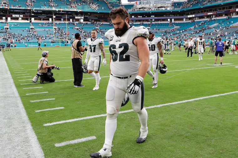 Eagles center Jason Kelce walks off the field after the Eagles lost to the Miami Dolphins, 37-31, on Sunday.