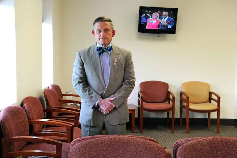 Joseph Costabile in the most familiar of all medical spaces - the waiting room - at his Voorhees office June 29, 2016.