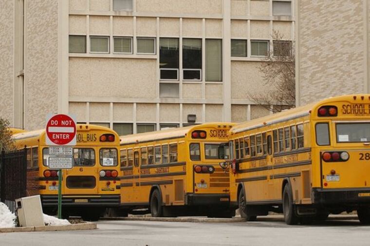 Buses line up at Lower Merion High School. Districts will have to pay heavily to prop up the sagging pension plan.