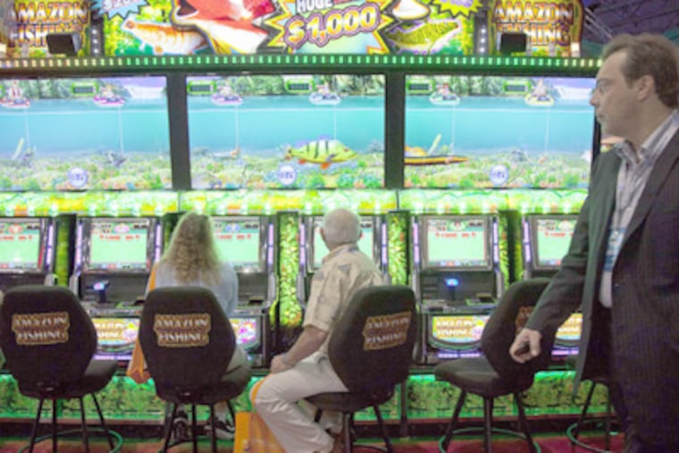 Internet gambling should be legal in the U.S., advocates say, because of millions in lost revenue and the jobs that come with it. (Julie Jacobson / Associated Press)