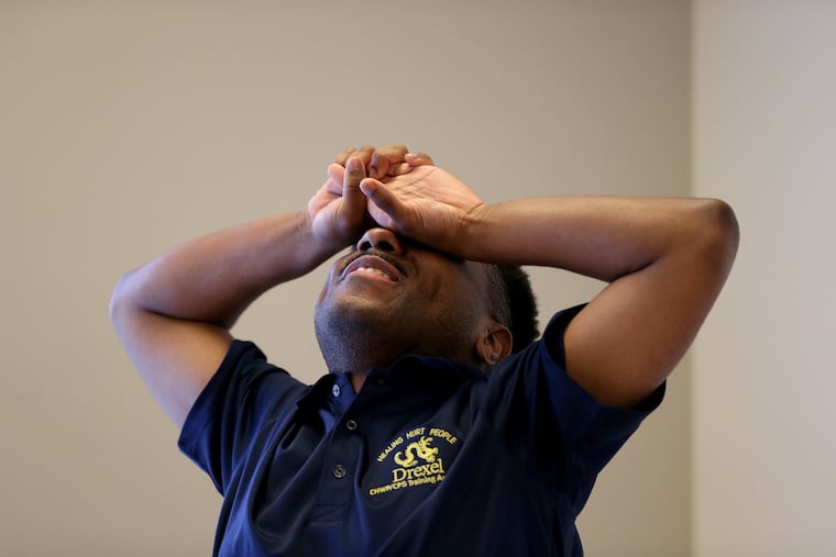 Isaiah Jackson reacts as he prepares to speak during the Drexel University Community Health Worker Peer Training.