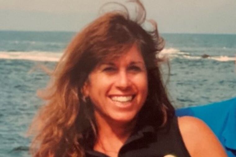 Sally Gendler sailing with her husband, Steven, in an undated vacation photo