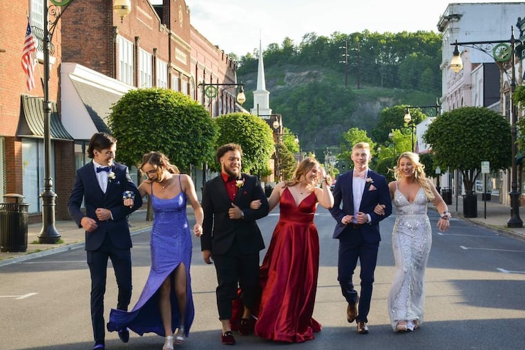 Wright Way Motors, a car dealership in Covington, Va., volunteered to host prom for Covington High School students. Before arriving at the dealership, senior students participated in the “Grand March,†a tradition where prom-goers parade down a central street.