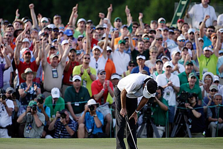 Bubba Watson reacts after winning the Masters. (Darron Cummings/AP)