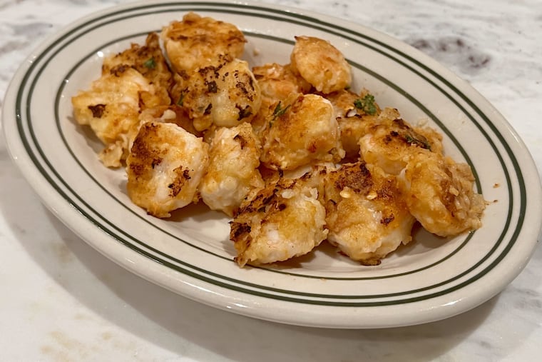 Shrimp pil pil, prepared in 2023 from Dmitri Chimes' recipe and served on an actual plate from the restaurant.