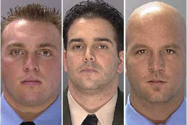 Philadelphia Police Officer George Sambuca, left; Detective Keith Gidelson, center; and Officer Joseph Mcintyre Jr., were charged as part of a steroid distribution ring.