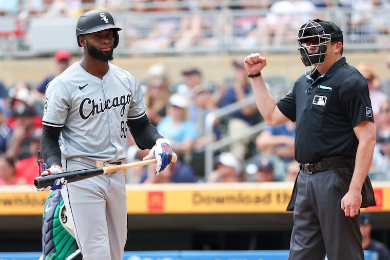 Luis Robert Jr. of the White Sox reacts after striking out over the weekend. His team is mired in one of baseball's worst losing streaks ever.