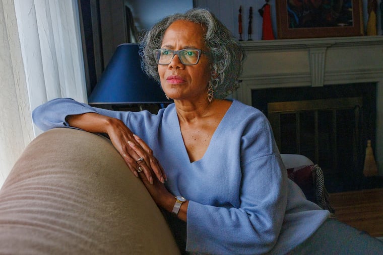 Lisa Dutton of Wynnewood, photographed at her home in 2023, has been cancer free for years after participating in Penn's trial.