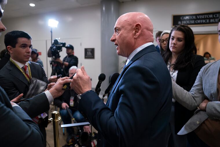 Sen. Mark Kelly, D-Ariz., speaks with reporters following a classified briefing on China, at the Capitol in Washington last week.