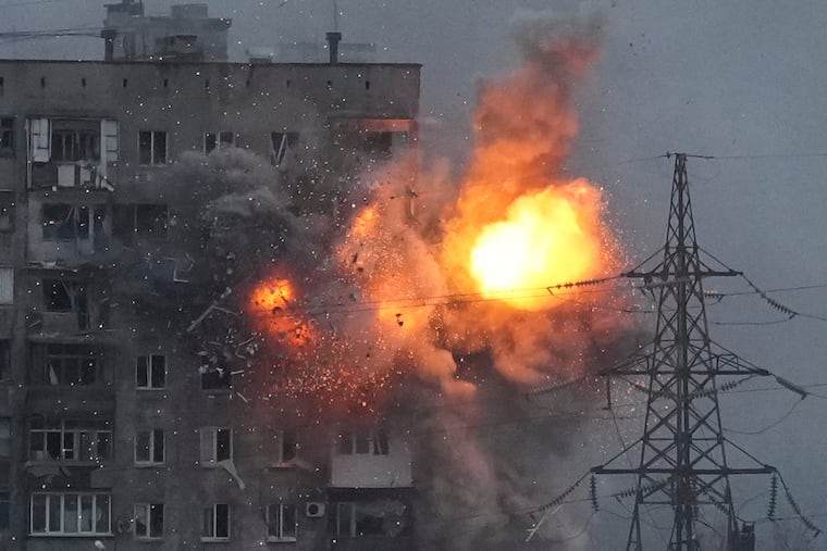 An explosion in an apartment building that came under fire from a Russian army tank in Mariupol, Ukraine, Friday, March 11, 2022. Ukraine’s military says Russian forces have captured the eastern outskirts of the besieged city of Mariupol. In a Facebook update Saturday, the military said the capture of Mariupol and Severodonetsk in the east were a priority for Russian forces. Mariupol has been under siege for over a week, with no electricity, gas or water.