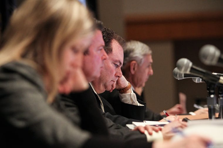 The Pennsylvania Gaming Control Board listens and takes notes during the casino hearing for The Provence in the Pennsylvania Convention Center Tuesday, Jan. 28, 2014. (Stephanie Aaronson/Philly.com)