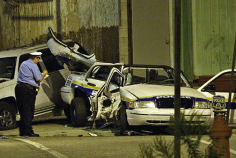 Wreckage remains after the accident in which Officer Isabel Nazario died in September when her police cruiser was slammed by a stolen car being pursued by other officers. (Steven M. Falk / Daily News)