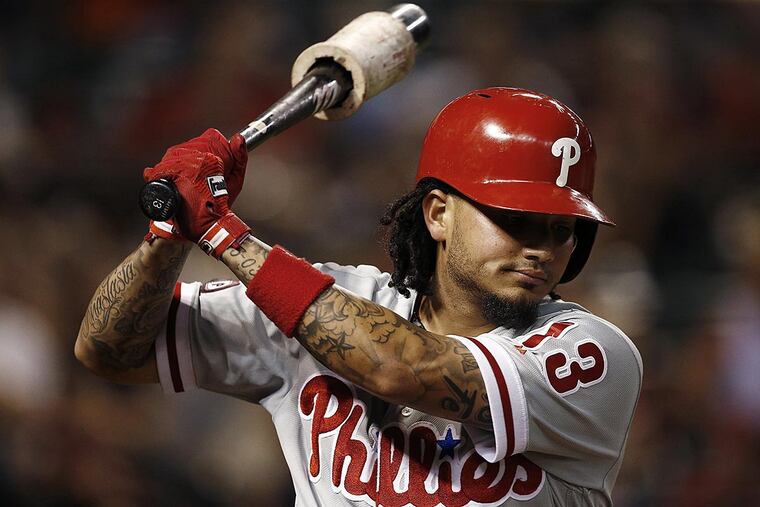Philadelphia Phillies' Freddy Galvis takes a practice swing before batting against the Arizona Diamondbacks during the fifth inning of a baseball game Friday, June 23, 2017, in Phoenix. The Phillies defeated the Diamondbacks 6-1.