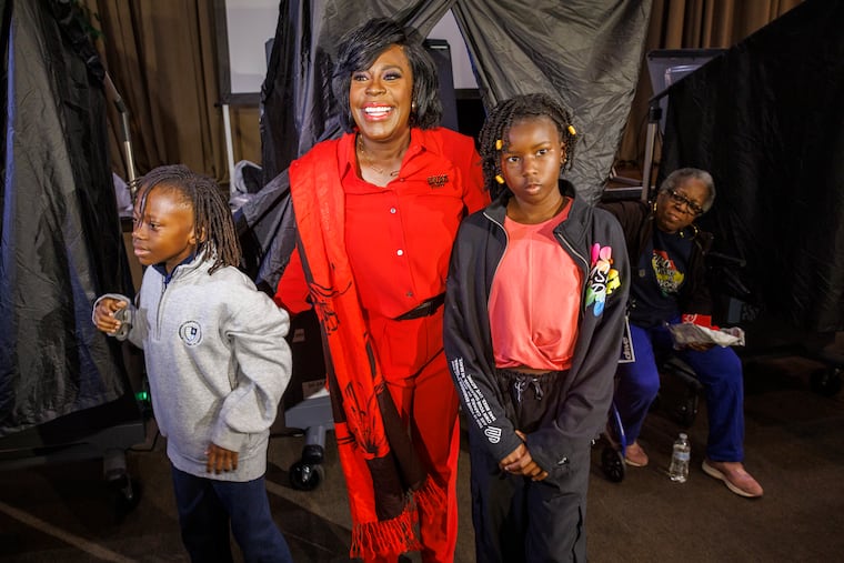 Philadelphia Democratic mayor-elect Cherelle Parker just after casting her vote Tuesday. At left is son Langston Mullins.