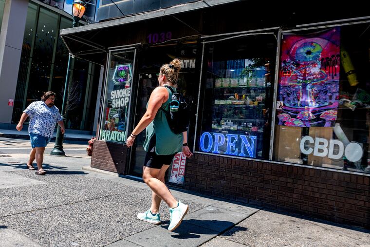 A smoke shop at 11th & Chestnut Streets in Philadelphia advertises kratom in window.