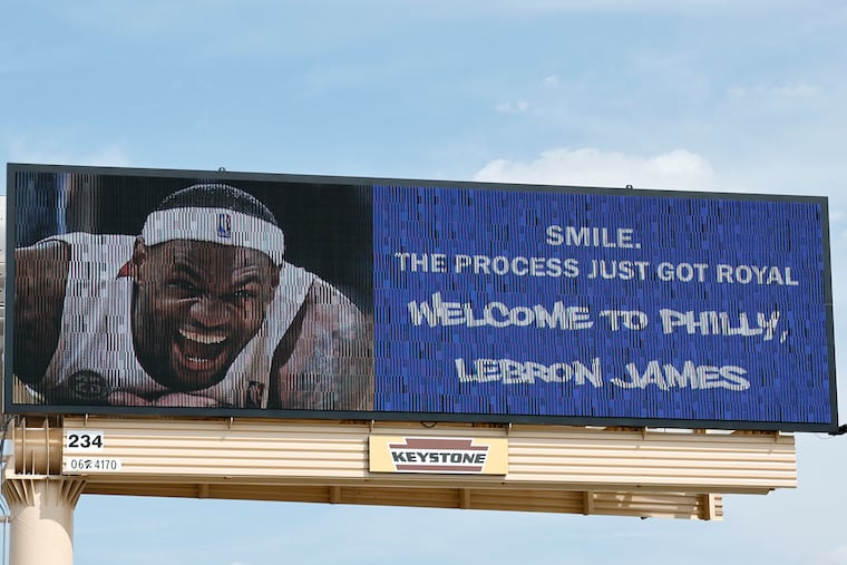 A billboard welcome sign for new Sixers LeBron James along Packer Avenue in South Philadelphia.