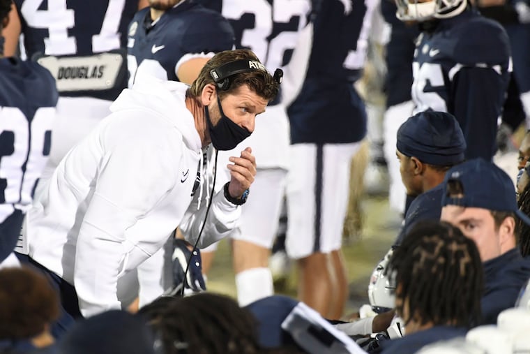 Penn State defensive coordinator Brent Pry talks with his players during the game against Iowa in November.