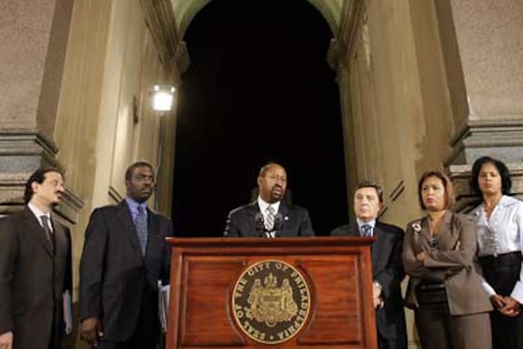 Mayor Michael Nutter holds a news conference on the city's budget problems at City Hall on Nov. 6. (David Maialetti / Staff Photographer)